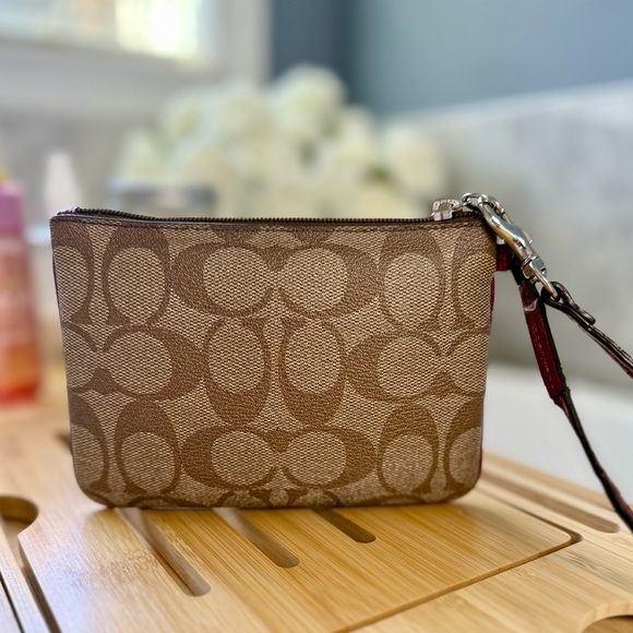 Coach Brown Signature Canvas Wristlet with Plum Trim - Picture 2 of 10